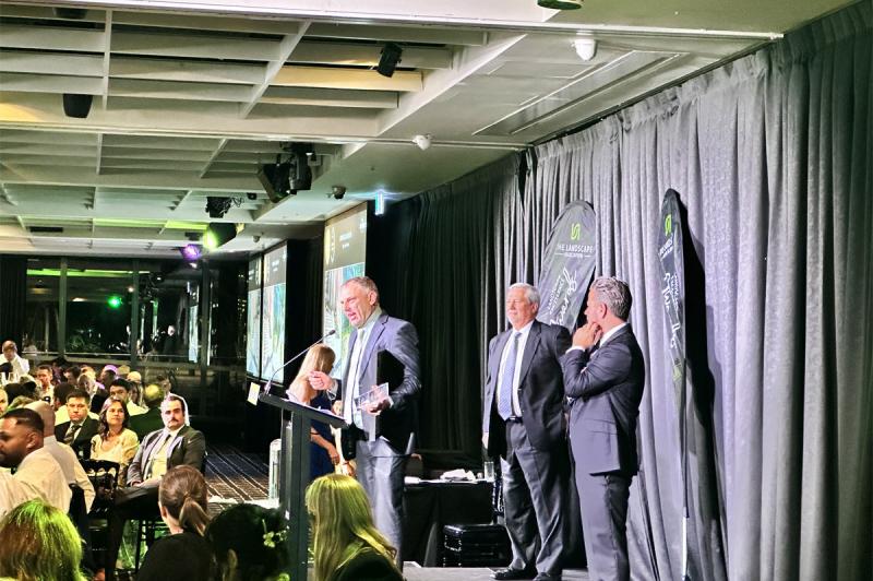 Glenn Simpson accepting the Gold Award and Best In Category Award for Commercial and Civil Construction Up to $250,000: Kings Lane Reserve 